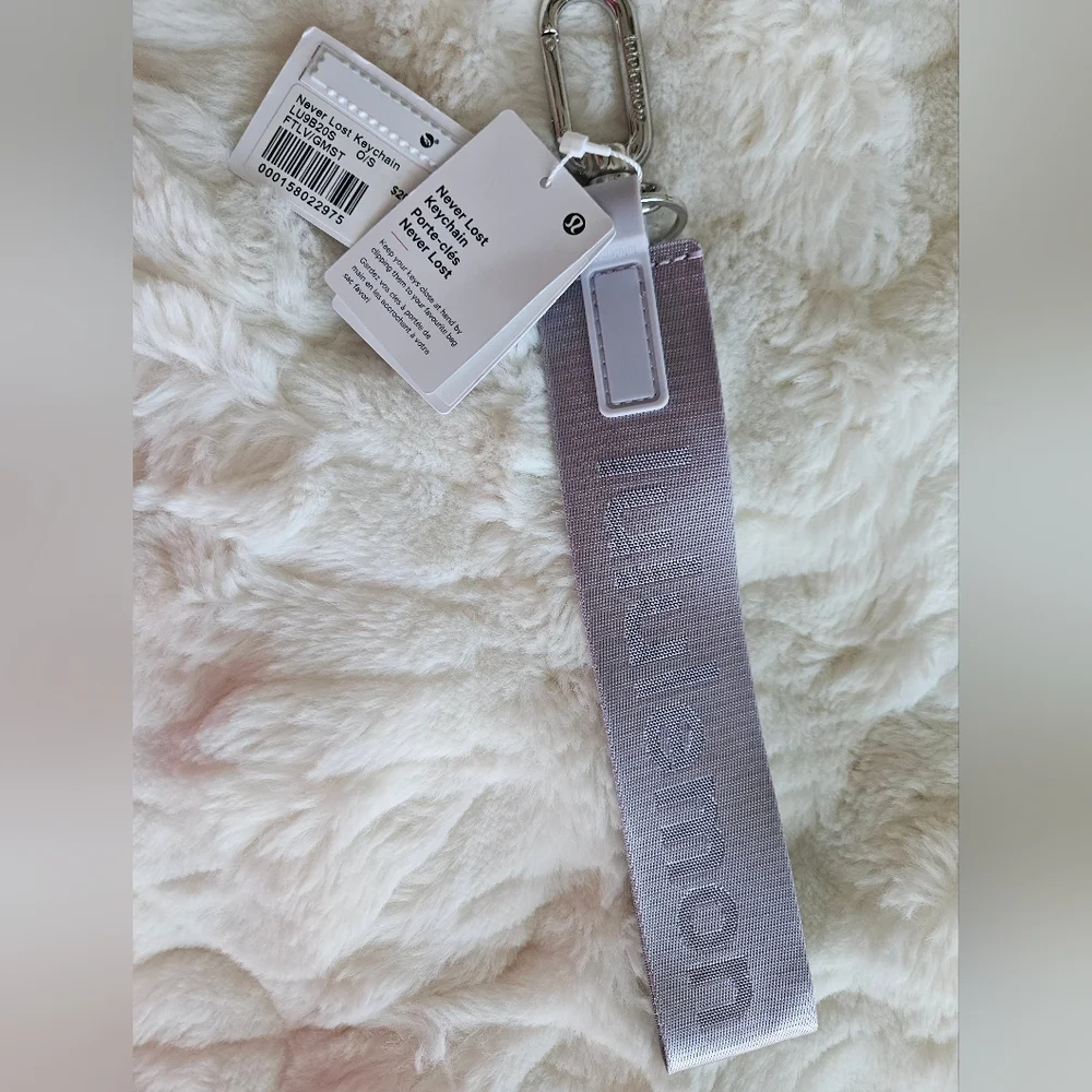 NWT Never Lost Keychain Faint Lavender/Grape Mist